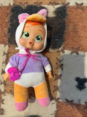 Plush Baby Doll in Purple, White, Orange with Pink Accessory
